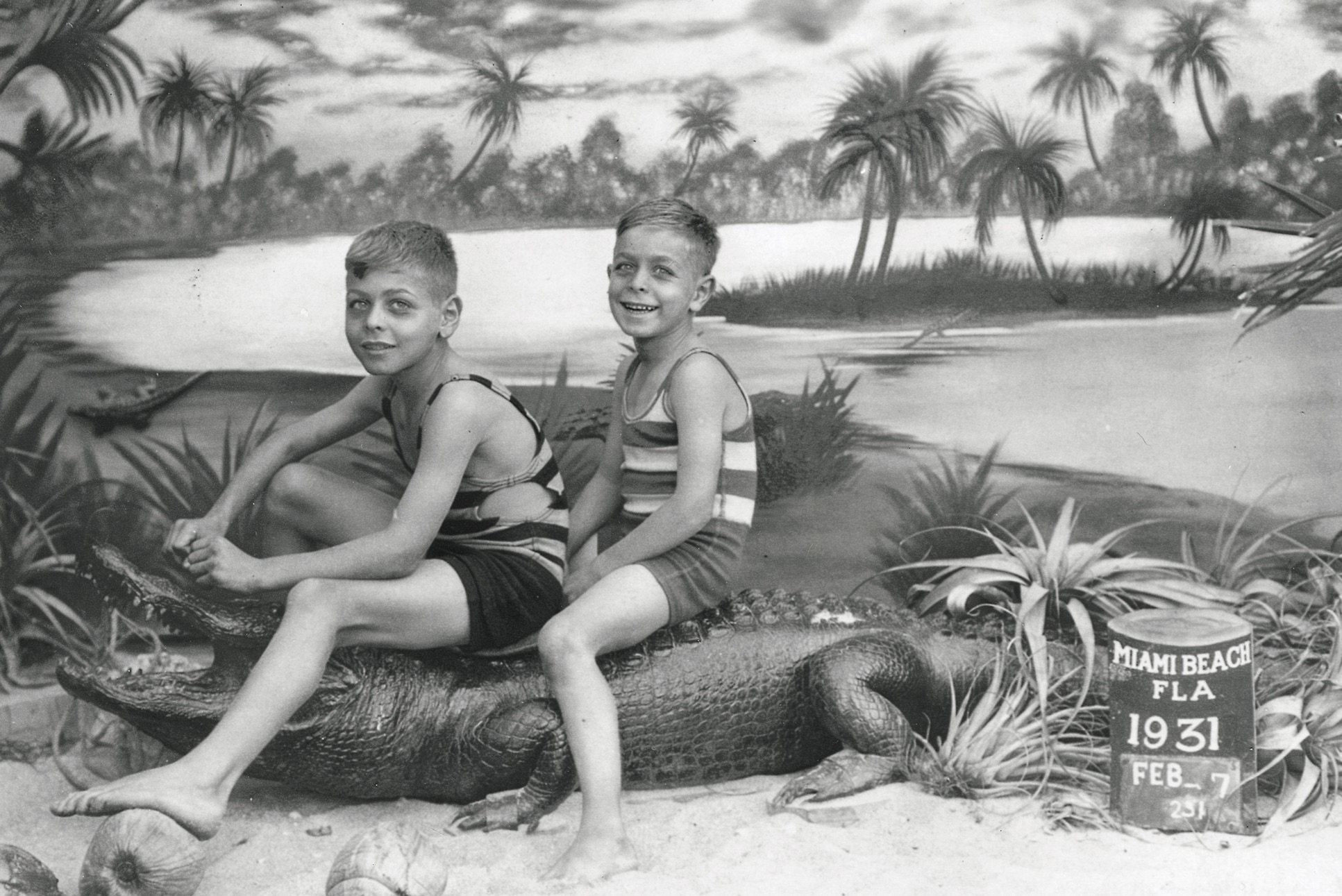 two boys on a gator