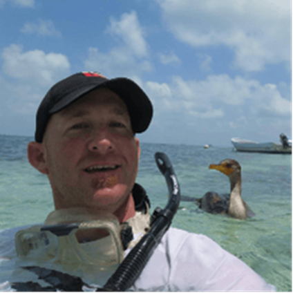 selfie of man in water with sea bird